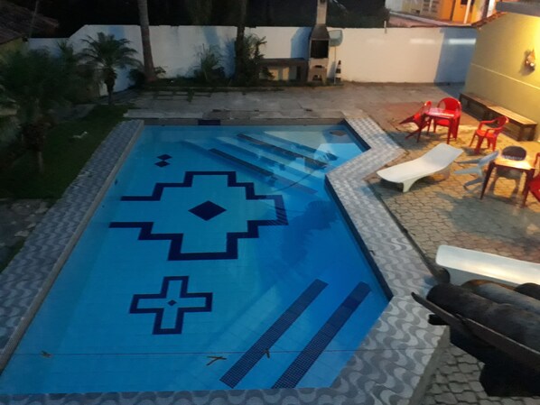 Outdoor pool, open 9 AM to 10 PM, pool umbrellas, pool loungers