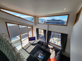 Apartment, 4 Bedrooms, Balcony | Living area | Flat-screen TV