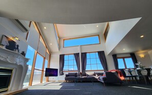 Apartment, 4 Bedrooms, Balcony | Living area | Flat-screen TV - U Suites on Courtenay (Wellington)