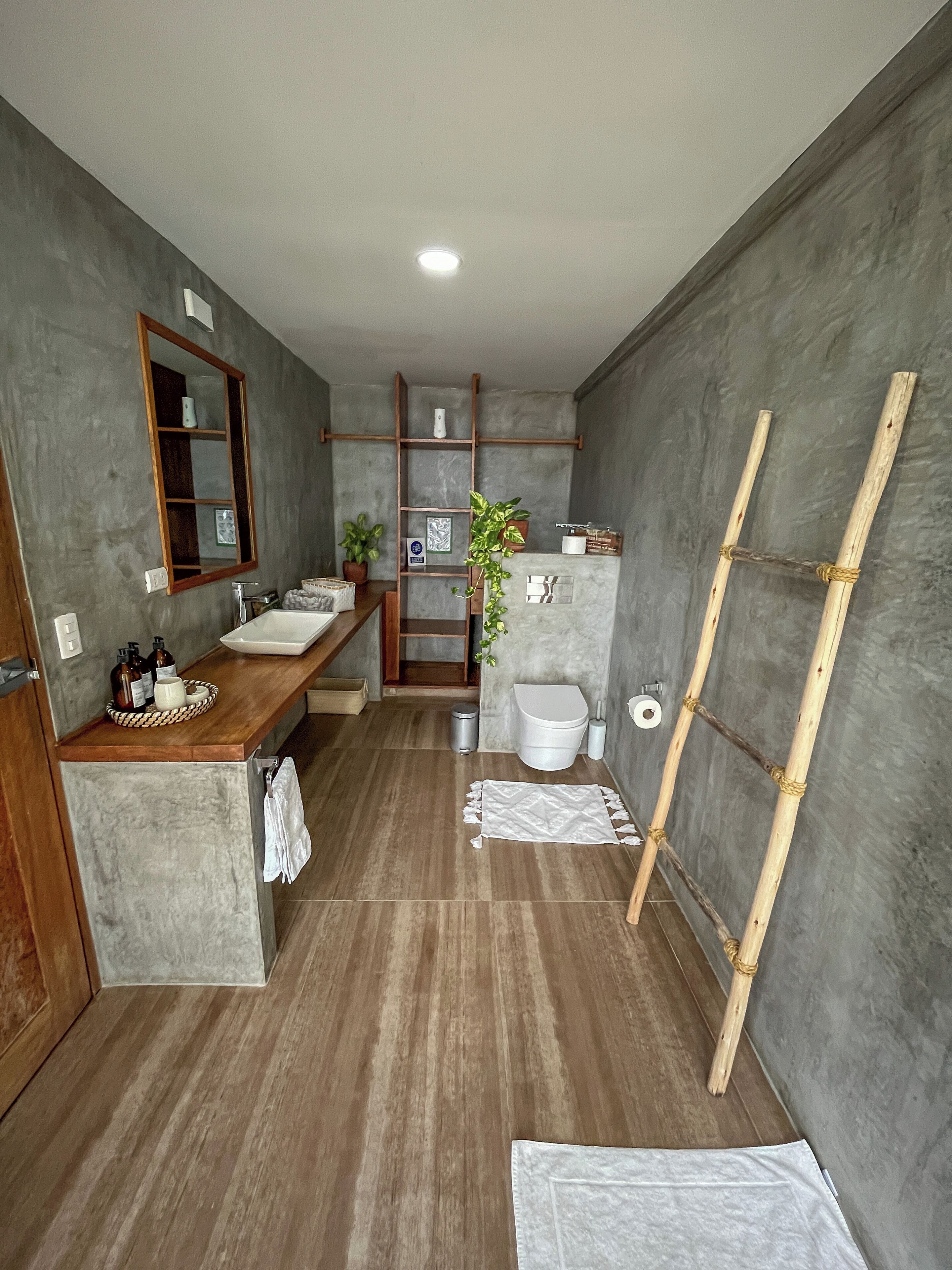 deluxe bungalow, 1 king bed, non smoking, private bathroom | bathroom | rainfall showerhead, free toiletries, hair dryer, towels