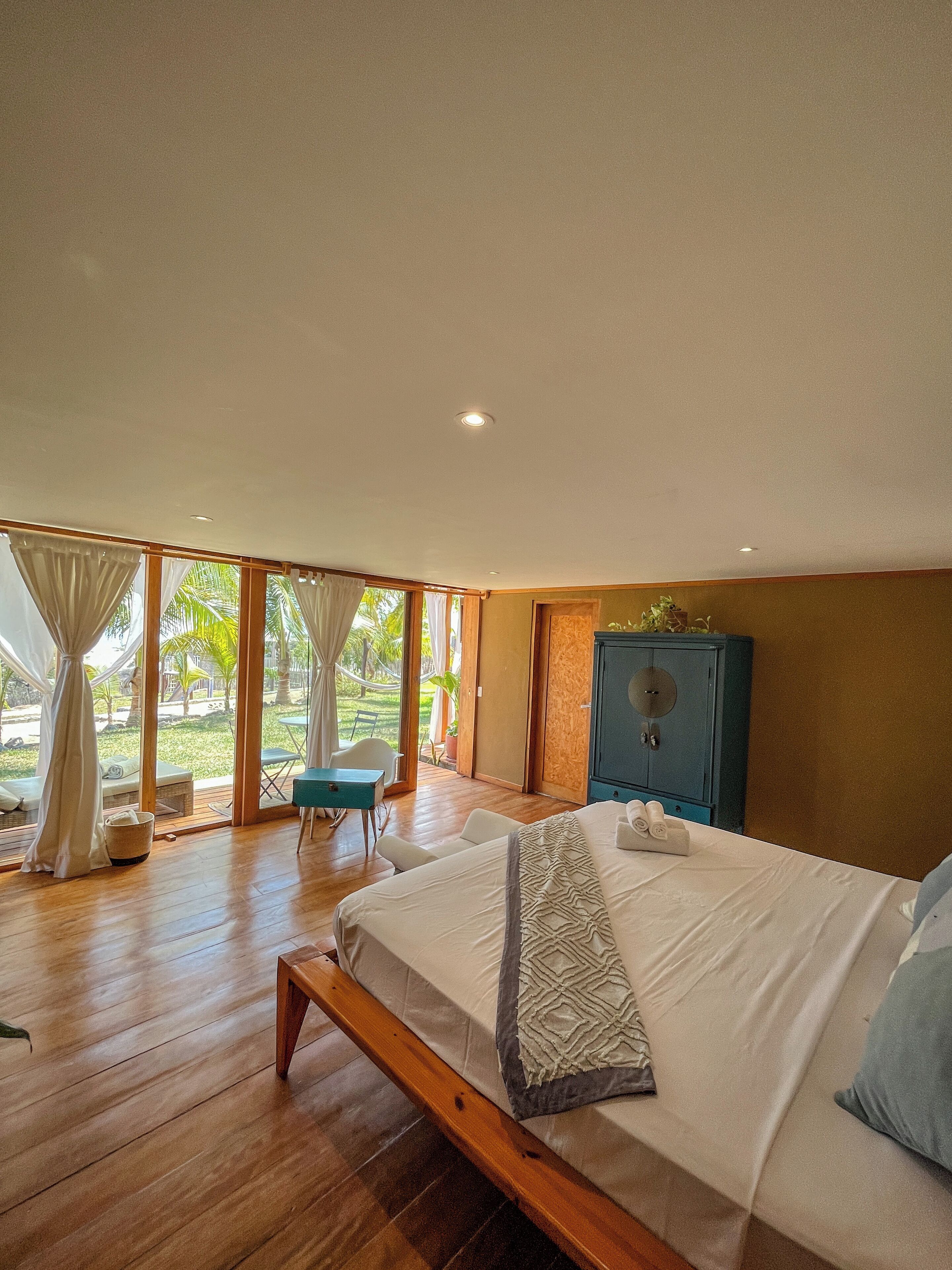 deluxe bungalow, 1 king bed, non smoking, private bathroom | premium bedding, minibar, in-room safe, blackout curtains