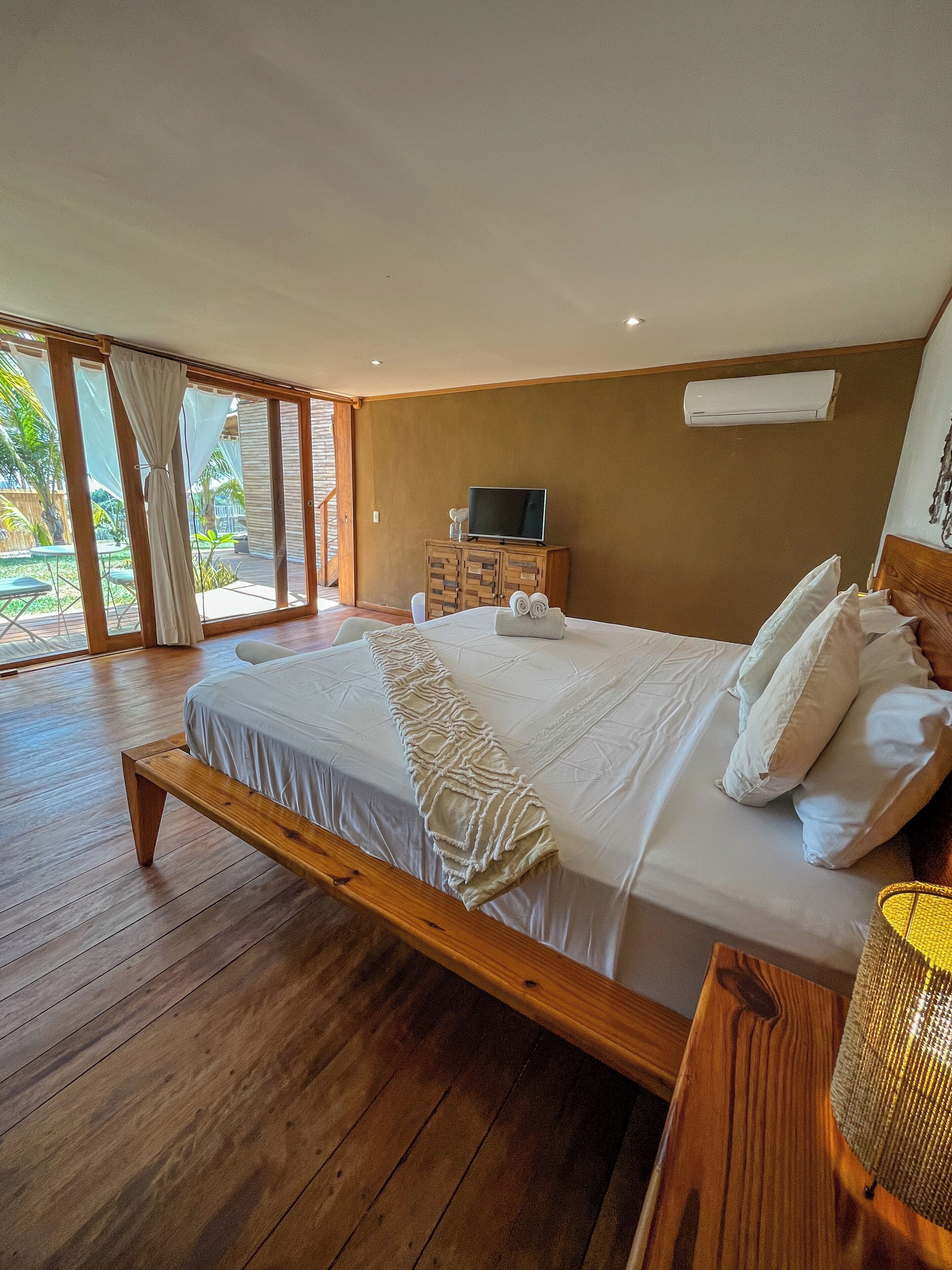 deluxe bungalow, 1 king bed, non smoking, private bathroom | premium bedding, minibar, in-room safe, blackout curtains