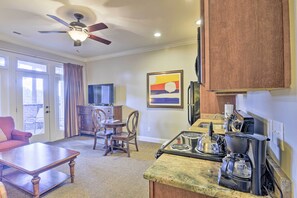 Fridge, microwave, stovetop, coffee/tea maker