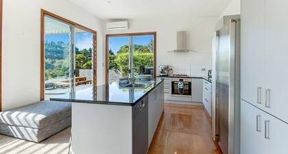 Karaka Sanctuary with Spa Pool - Tranquil Family-Friendly Holiday Home