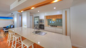 Fridge, microwave, stovetop, dishwasher - Maggies Beachfront Apt. 3 (Horseshoe Bay)