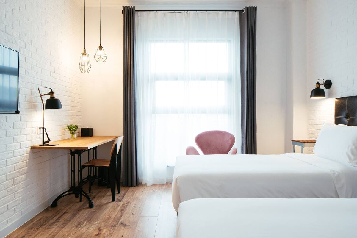 Habitación superior con 2 camas individuales | 1 dormitorio, edredones de plumas, colchones con acolchado adicional