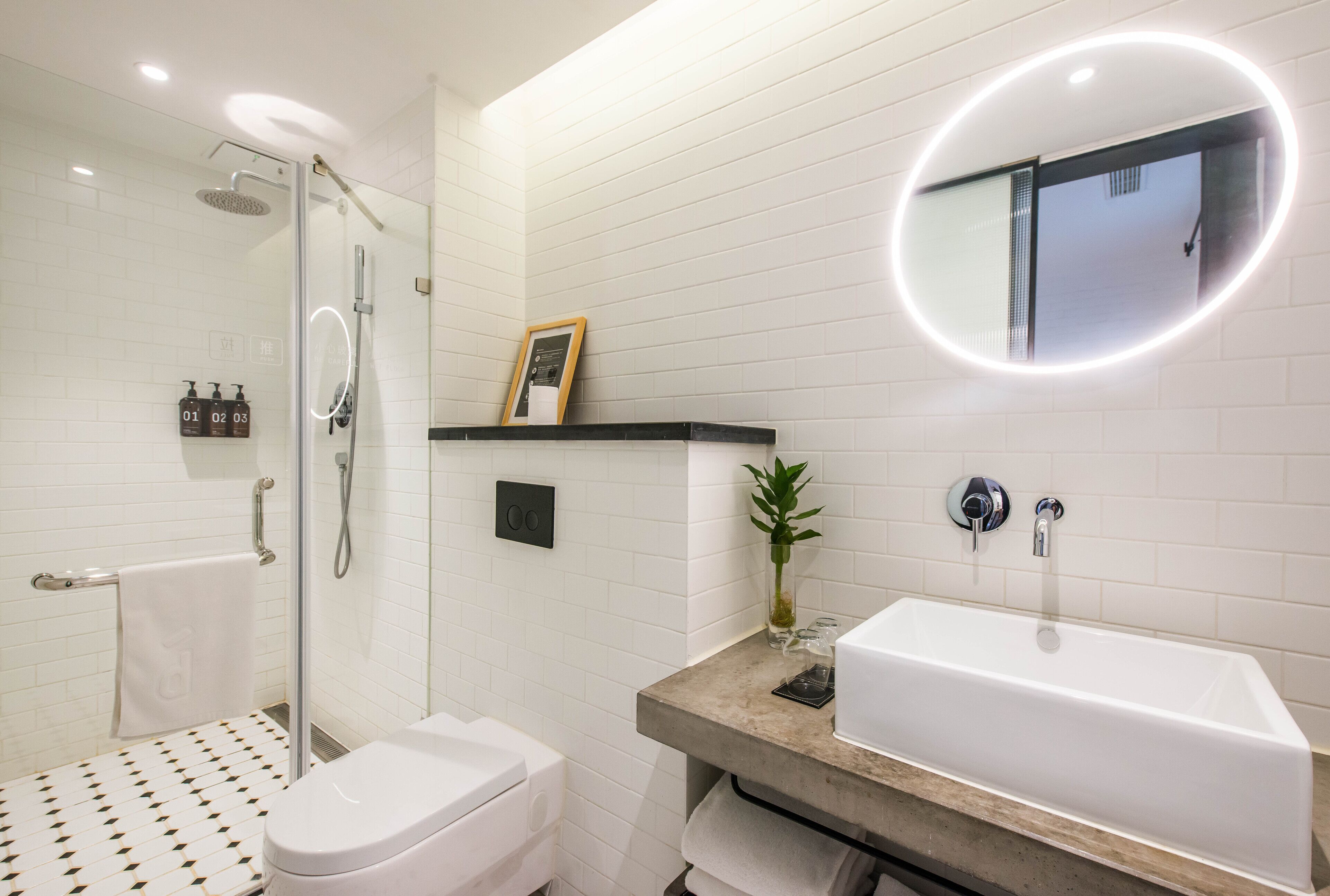 basic twin room | bathroom | shower, rainfall showerhead, eco-friendly toiletries, hair dryer