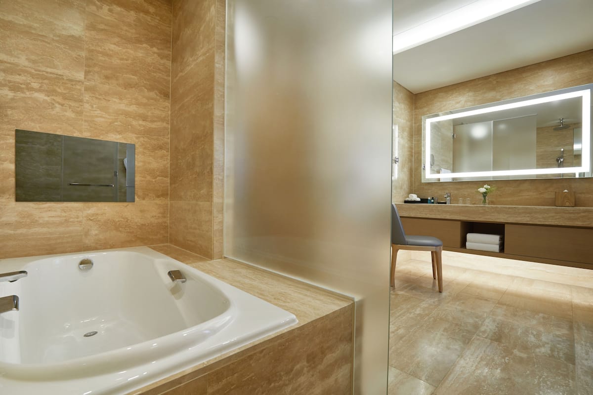 hair dryer, bathrobes, slippers, towels