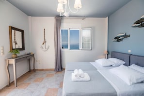 3 عدّة غرف نوم ومكواة/لوح كي وخدمة الإنترنت وملاءات أسرّة