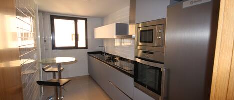 Fridge, microwave, dishwasher, coffee/tea maker