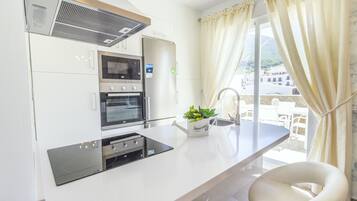 Réfrigérateur, micro-ondes, four, lave-vaisselle