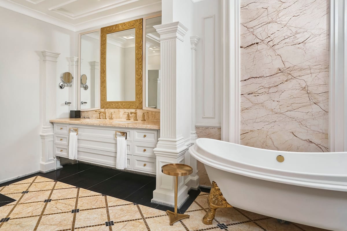 presidential suite, 1 king bed, non smoking (view) | bathroom | separate bathtub and shower, free toiletries, hair dryer, slippers