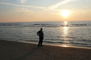 Beach nearby, sun loungers
