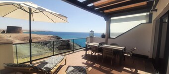 Best location on 2 floors (with penthouse) directly by the sea. Dream view from 3 terraces