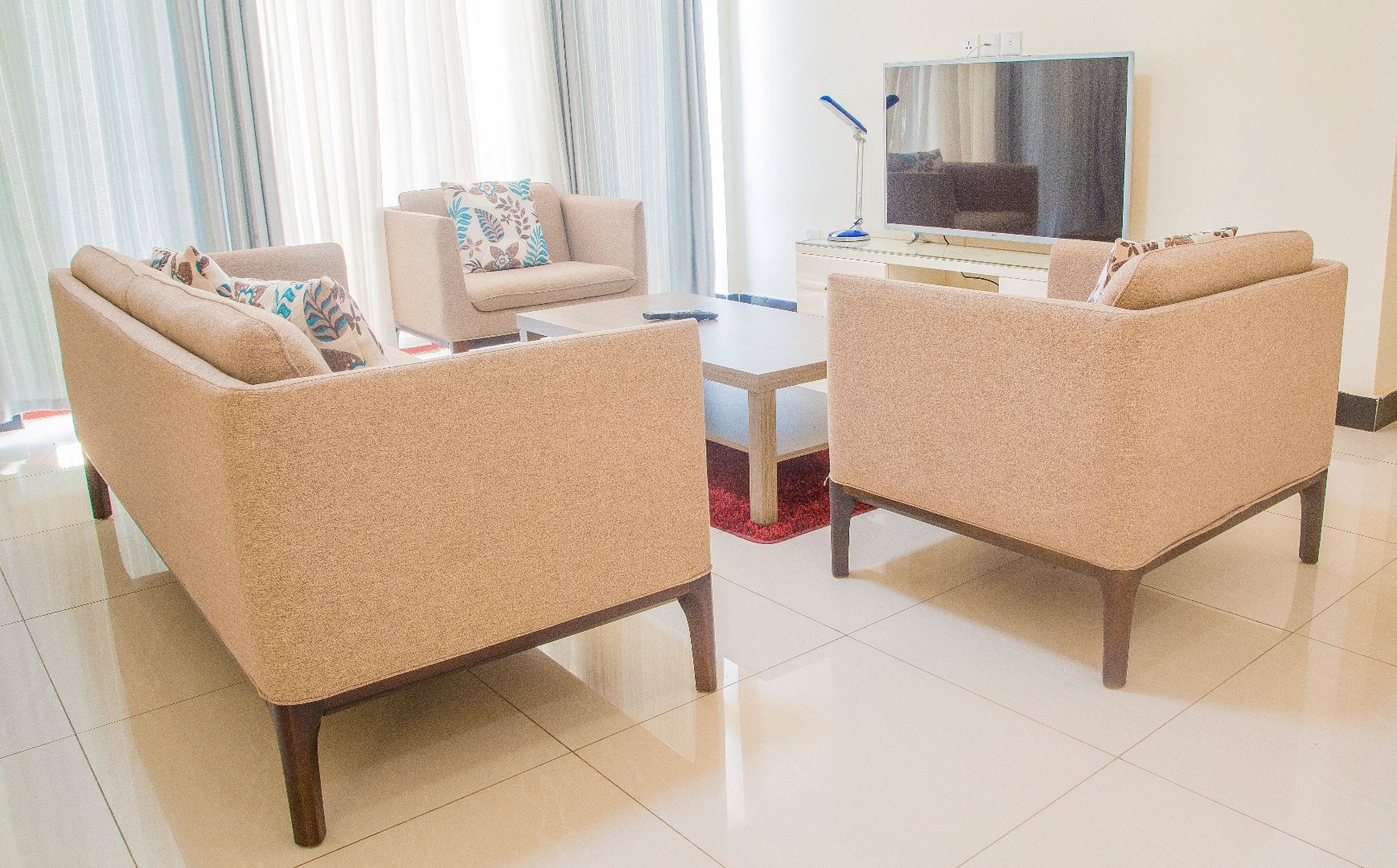 Apartment, 2 Bedrooms | Living area | 32-inch TV with digital channels