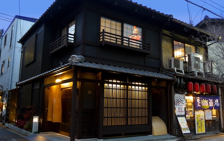 Front of property - evening/night. Machiya Kaemon Kyoto-sta.