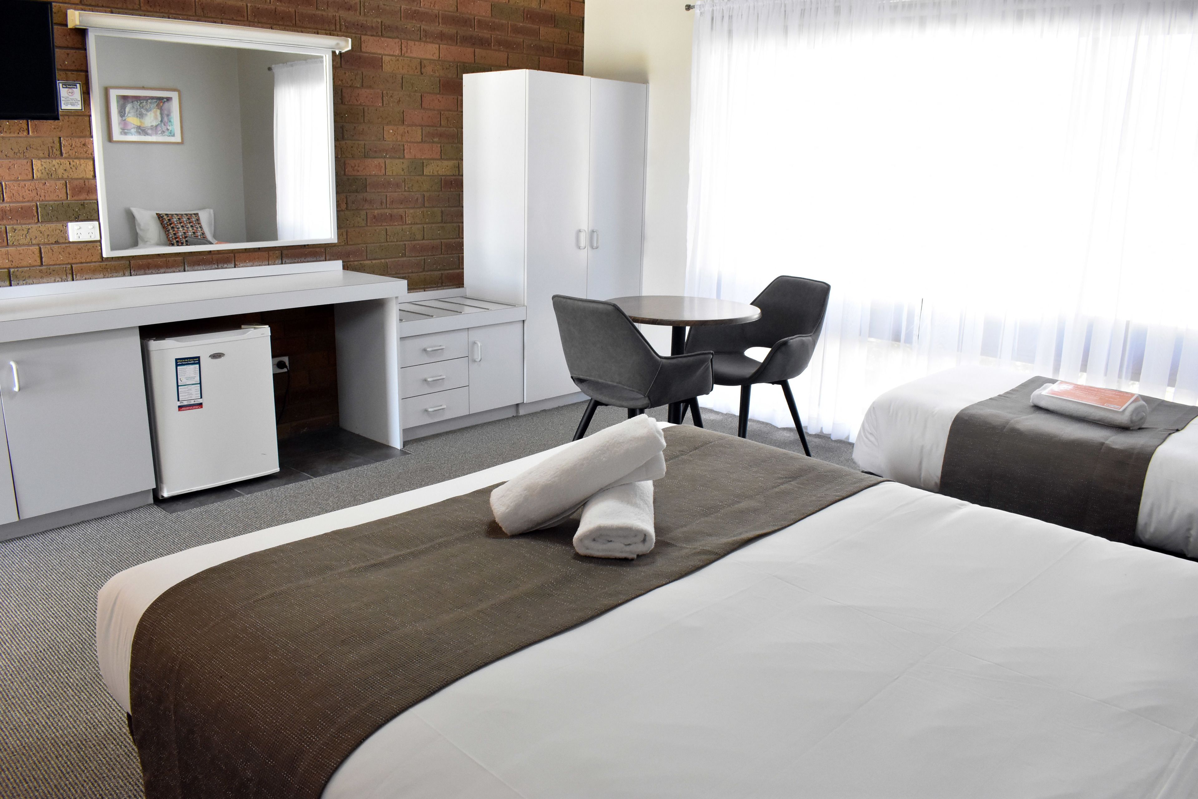 Habitación ejecutiva, con acceso para personas discapacitadas, baño privado | Cortinas blackout, tabla de planchar con plancha y wifi gratis 