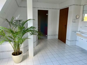 Shower, hair dryer, towels, soap