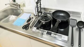 Fridge, microwave, stovetop, cookware/dishes/utensils