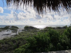 On the beach, sun-loungers, beach towels