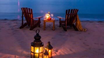 On the beach, sun loungers, beach towels