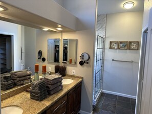 Combined shower/tub, hair dryer, towels, toilet paper