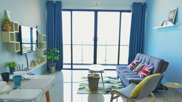 Apartment, 1 Bedroom | Living area | Flat-screen TV