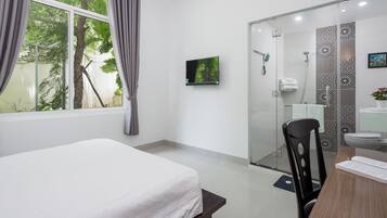 Family Apartment, 2 Bedrooms, Garden View, Beachside | Minibar, desk, free WiFi, bed sheets