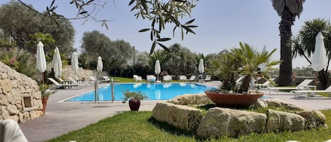 Seasonal outdoor pool, open 10 AM to 6:00 PM, sun loungers