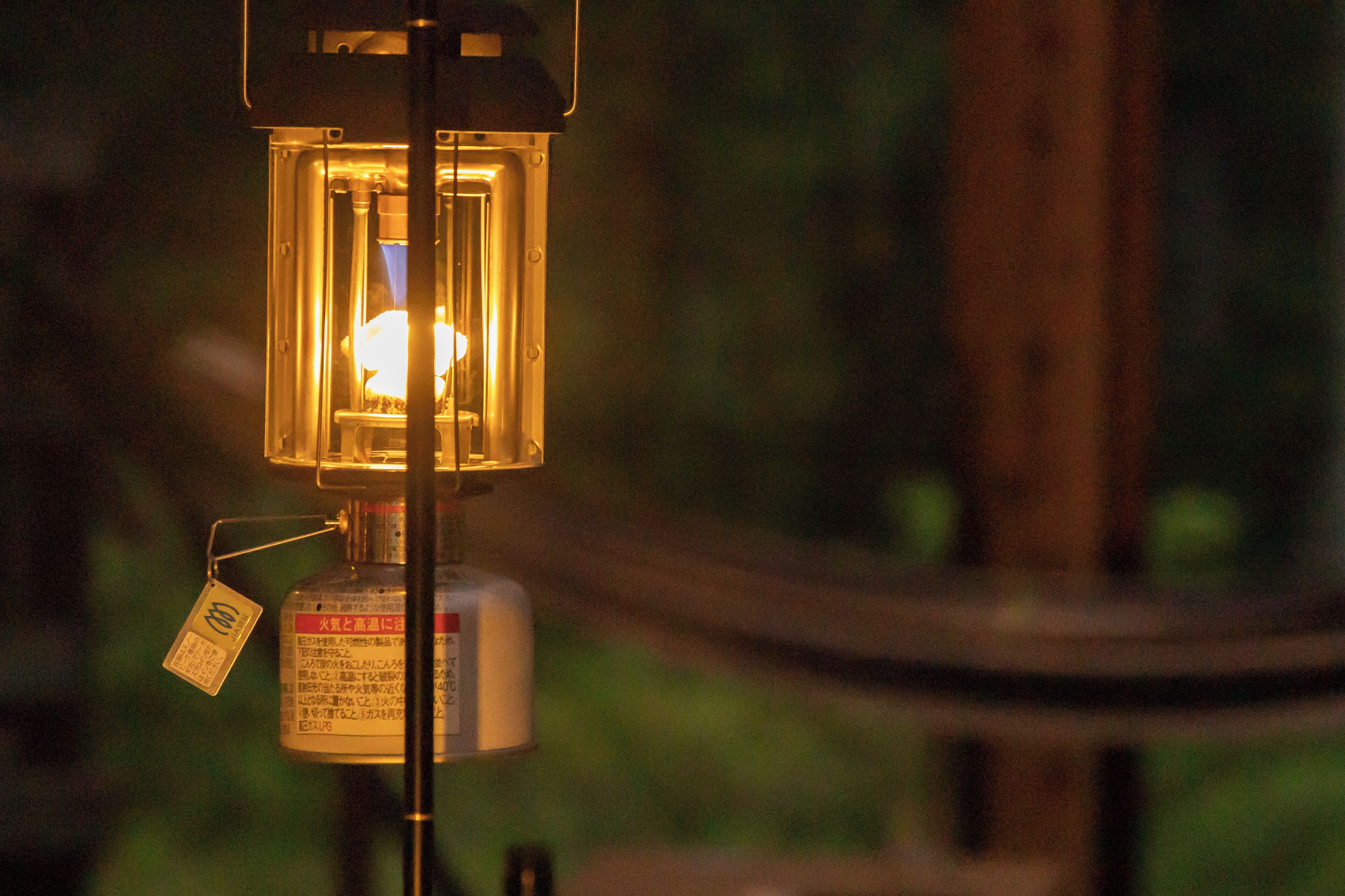 A lantern with a tag, possibly indicating a location or event.