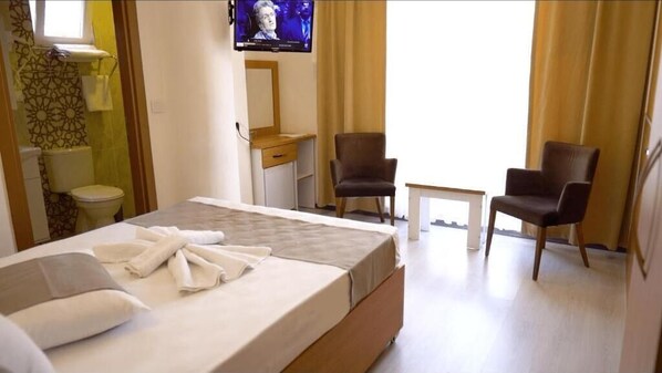 Laptop workspace, free WiFi, bed sheets