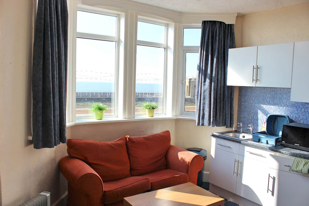Apartment, 2 Bedrooms (Apartment 3, First Floor ) | Living area | Flat-screen TV