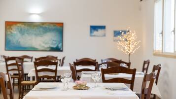 Breakfast, lunch, dinner served; local cuisine, garden views