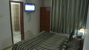 Kamar Double Deluks untuk 1 Orang | Seprai linen