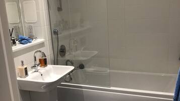 Luxury Apartment, Multiple Beds, Non Smoking | Bathroom | Deep-soaking bathtub, rainfall showerhead, designer toiletries