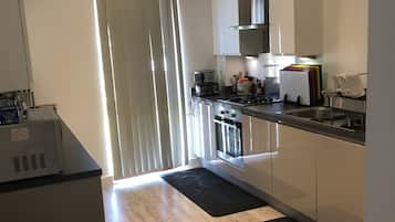 Luxury Apartment, Multiple Beds, Non Smoking | Private kitchen | Full-sized fridge, microwave, oven, stovetop
