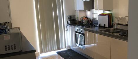 Luxury Apartment, Multiple Beds, Non Smoking | Private kitchen