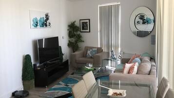 Luxury Apartment, Multiple Beds, Non Smoking | Living room | 56-inch Smart TV with satellite channels, TV, Netflix