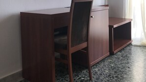 A wooden desk with a chair and a mirror. - Natalie Apartments (Sithonia)