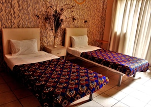 Roupas de cama premium, ferros/tábuas de passar roupa, Wi-Fi de cortesia