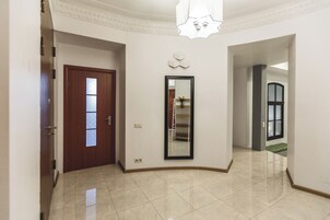 Superior Apartment, 4 Bedrooms, Courtyard Area | Living area | Flat-screen TV