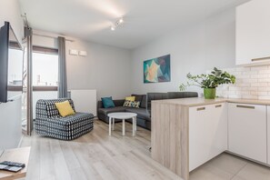 Deluxe Apartment | Living area | Flat-screen TV - Chill Apartments (Warsaw)