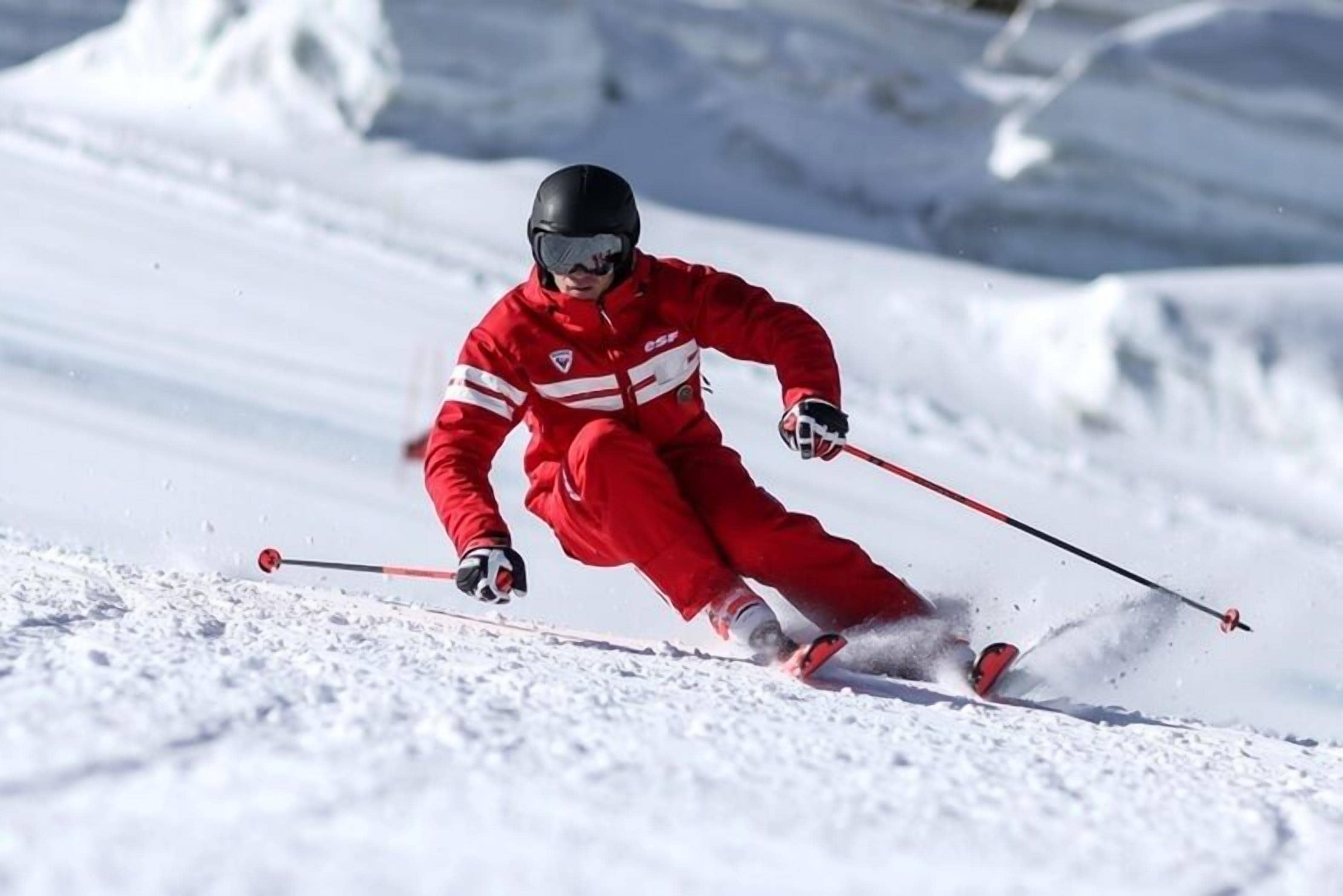 A person skiing on a snowy slope.