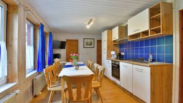 Fridge, stovetop, coffee/tea maker, electric kettle
