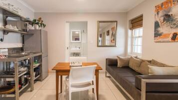 Mint Crash Pad - Unit 5 | Living area | Flat-screen TV