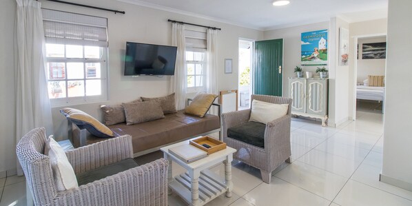 Rosemary Cottage- Two Bedroom | Living area | Flat-screen TV - Langebaan Kite Cottages (Langebaan)