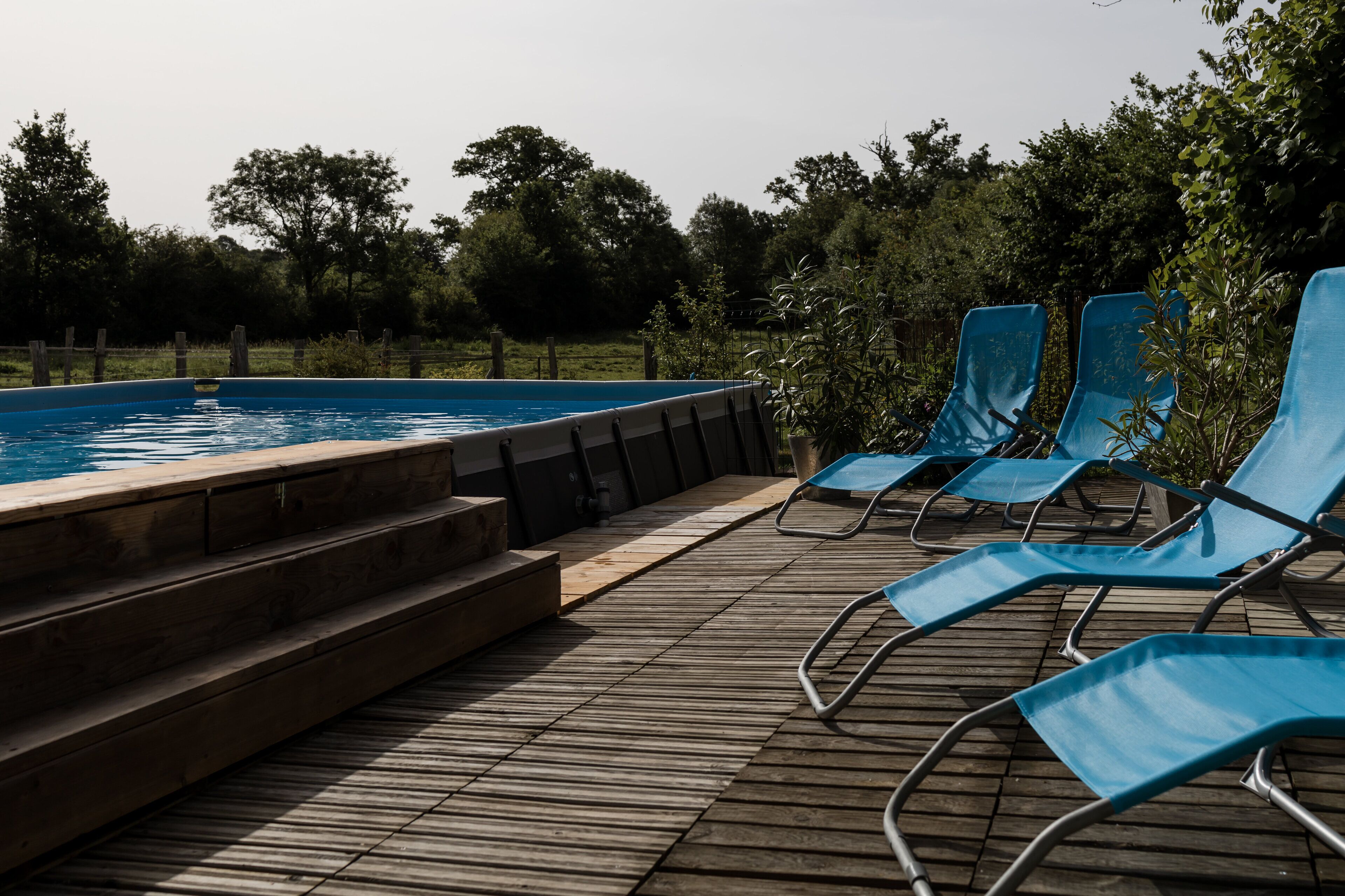 Seasonal outdoor pool, pool umbrellas, sun loungers