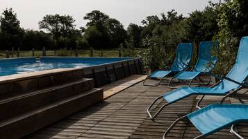 Seasonal outdoor pool, pool umbrellas, sun loungers