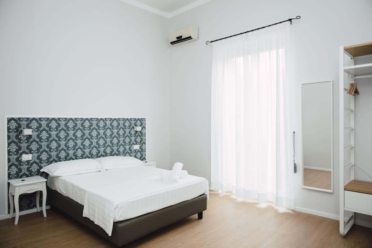 Desk, blackout curtains, free cots/infant beds, free WiFi