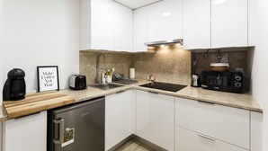 Apartment, 1 Bedroom | Private kitchenette | Coffee/tea maker, full-size fridge, microwave, oven